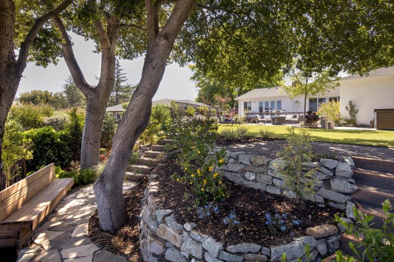 Rock Wall hook in backyard